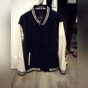 Blue and white Primark team jacket